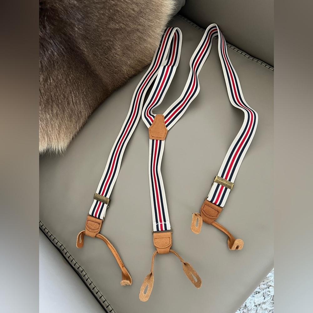 True Religion’s tan and multicolor suspenders. Add style effortlessly.